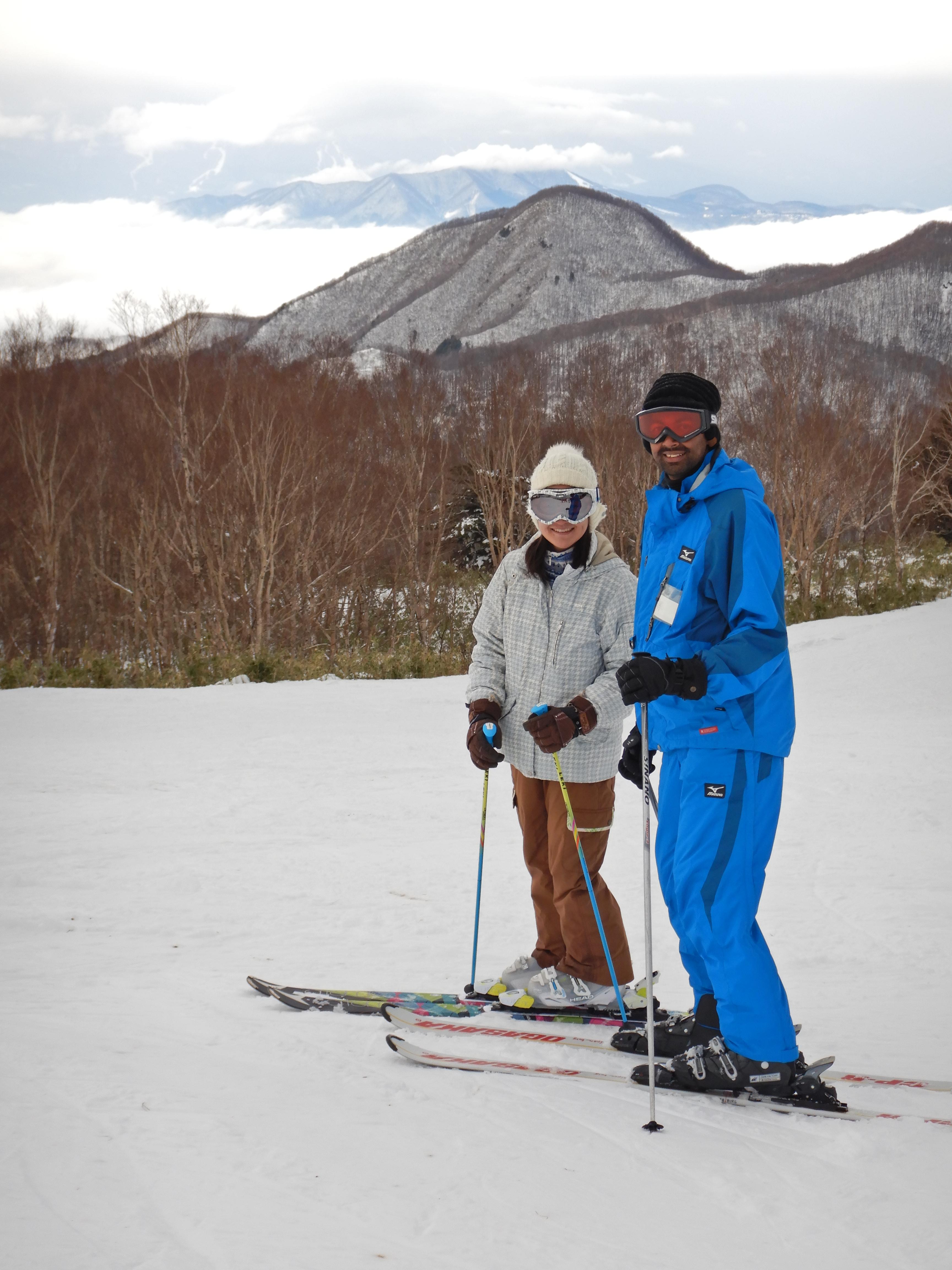 A portrait picture of me skiing with my wife